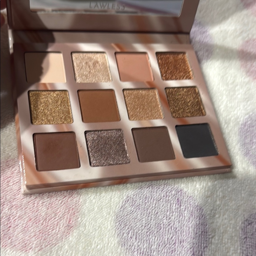 LAWLESS Eyeshadow Palette with Gold, Brown, and Black Shades